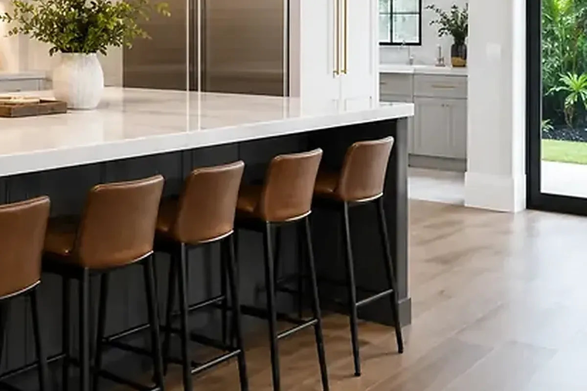 Stone island and seating in a remodelled kitchen — architectural rendering